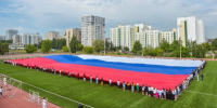 Сотрудники Росприроднадзора приняли участие в акциях ко Дню Государственного флага России - Росприроднадзор