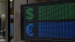 Банк России повысил официальные курсы доллара и...